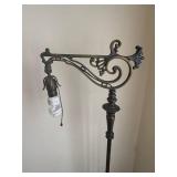 Ornate Cast-Iron Floor Lamp with Scroll Arm and Lattice Base Ornate Cast-Iron Floor Lamp with Scroll Arm and Lattice Base