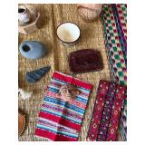 Assorted Tribal Artifacts on Woven Rug - Canvas Pouch, Leather Medallion, Stone Beads, Textiles Assorted Tribal Artifacts on Woven Rug - Canvas Pouch, Leather Medallion, Stone Beads, Textiles