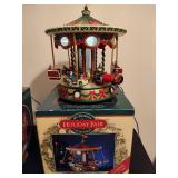 Holiday in Motion Revolving Lodge & Holiday Fair Carousel Holiday in Motion Revolving Lodge & Holiday Fair Carousel