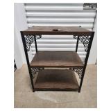Three-Tier Wood & Iron Shelf with Decorative Scrollwork Brackets Three-Tier Wood & Iron Shelf with Decorative Scrollwork Brackets