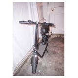 NEW Electric Scooter. w/lock & charger, extra inner tube for tire. 12' tires