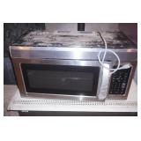 under-the-counter LG Microwave Oven (scratch & dent) working condition unknown