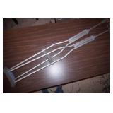 Adjustable Aluminum Crutches (one does not have a foot)