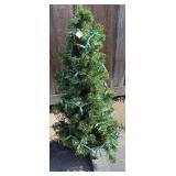 Two Small Artificial Christmas Trees & Merry Christmas Doormat Two Small Artificial Christmas Trees & Merry Christmas Doormat