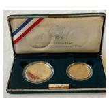 1992 Columbus Quincentenary 2 coin Proof set (Silver Dollar/Half Dollar) - case is fire damaged, no COA but coins appear to be in good shape