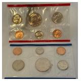 1987 P/D Uncirculated US Mint set OGP - original package but with fire damage