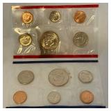 1987 P/D Uncirculated US Mint set OGP - original package but with fire damage