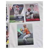 Lot of 27 Baseball Cards Featuring Players like Mike Trout, Nolan Ryan, and Derek Jeter with Various Sets and Rookie Cards. Lot of 27 Baseball Cards Featuring Players like Mike Trout, Nolan Ryan, and Derek Jeter with Various Sets and Rookie Cards.