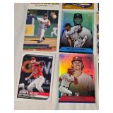 Lot of 27 Baseball Cards Featuring Players like Mike Trout, Nolan Ryan, and Derek Jeter with Various Sets and Rookie Cards. Lot of 27 Baseball Cards Featuring Players like Mike Trout, Nolan Ryan, and Derek Jeter with Various Sets and Rookie Cards.