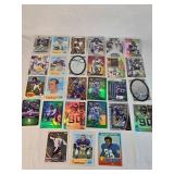 Lot of 27 Minnesota Vikings Football Cards featuring players like Alan Page, Warren Moon, Justin Jefferson, and Adrian Peterson. Includes Rookie, Holo, and Vintage cards. Lot of 27 Minnesota Vikings Football Cards featuring players like Alan Page, Warren Moon, Justin Jefferson, and Adrian Peterson. Includes Rookie, Holo, and Vintage cards.