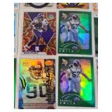 Lot of 27 Minnesota Vikings Football Cards featuring players like Alan Page, Warren Moon, Justin Jefferson, and Adrian Peterson. Includes Rookie, Holo, and Vintage cards. Lot of 27 Minnesota Vikings Football Cards featuring players like Alan Page, Warren Moon, Justin Jefferson, and Adrian Peterson. Includes Rookie, Holo, and Vintage cards.