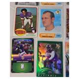 Lot of 27 Minnesota Vikings Football Cards featuring players like Alan Page, Warren Moon, Justin Jefferson, and Adrian Peterson. Includes Rookie, Holo, and Vintage cards. Lot of 27 Minnesota Vikings Football Cards featuring players like Alan Page, Warren Moon, Justin Jefferson, and Adrian Peterson. Includes Rookie, Holo, and Vintage cards.