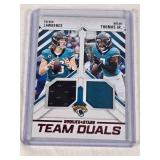 Trevor Lawrence & Brian Thomas Jr. 2025 Panini Rookies & Stars Team Duals Dual relic #TD-JAX - Jacksonville Jaguars Football Card Trevor Lawrence & Brian Thomas Jr. 2025 Panini Rookies & Stars Team Duals Dual relic #TD-JAX - Jacksonville Jaguars Football Card