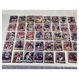 Lot of 39 1st Bowman Football Cards featuring various players including Deontae Lawson, Francisco Mauigoa Lot of 39 1st Bowman Football Cards featuring various players including Deontae Lawson, Francisco Mauigoa