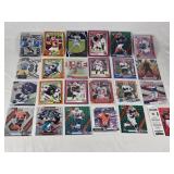 Lot of 24 Inserts and Relic Football Cards Featuring Players Like Lamar Jackson, Justin Herbert, and Trevor Lawrence. Includes Rookie Cards and Special Inserts. Lot of 24 Inserts and Relic Football Cards Featuring Players Like Lamar Jackson, Justin Herbert, and Trevor Lawrence. Includes Rookie Cards and Special Inserts.