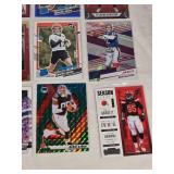 Lot of 24 Inserts and Relic Football Cards Featuring Players Like Lamar Jackson, Justin Herbert, and Trevor Lawrence. Includes Rookie Cards and Special Inserts. Lot of 24 Inserts and Relic Football Cards Featuring Players Like Lamar Jackson, Justin Herbert, and Trevor Lawrence. Includes Rookie Cards and Special Inserts.