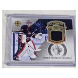 Connor Hellebuyck GOLD MEDAL GOALIE 2022-23 Upper Deck Ultimate Jersey Tendys Memorabilia #UT-CH - Winnipeg Jets Hockey Card Connor Hellebuyck GOLD MEDAL GOALIE 2022-23 Upper Deck Ultimate Jersey Tendys Memorabilia #UT-CH - Winnipeg Jets Hockey Card