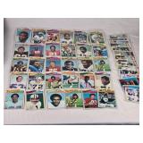 Huge Lot of Vintage Football Cards Featuring Various Players from the 1970s Era Including Teams like Dolphins, Cardinals, and Browns. Huge Lot of Vintage Football Cards Featuring Various Players from the 1970s Era Including Teams like Dolphins, Cardinals, and Browns.