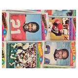 Huge Lot of Vintage Football Cards Featuring Various Players from the 1970s Era Including Teams like Dolphins, Cardinals, and Browns. Huge Lot of Vintage Football Cards Featuring Various Players from the 1970s Era Including Teams like Dolphins, Cardinals, and Browns.