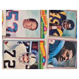 Huge Lot of Vintage Football Cards Featuring Various Players from the 1970s Era Including Teams like Dolphins, Cardinals, and Browns. Huge Lot of Vintage Football Cards Featuring Various Players from the 1970s Era Including Teams like Dolphins, Cardinals, and Browns.