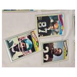 Huge Lot of Vintage Football Cards Featuring Various Players from the 1970s Era Including Teams like Dolphins, Cardinals, and Browns. Huge Lot of Vintage Football Cards Featuring Various Players from the 1970s Era Including Teams like Dolphins, Cardinals, and Browns.
