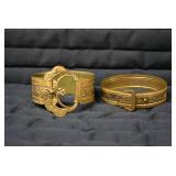 (2) metal bracelets... (2) metal bracelets...