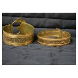(2) metal bracelets... (2) metal bracelets...