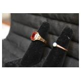 Ladies rings, one with red stone is... Ladies rings, one with red stone is...