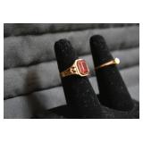 Ladies rings, one with red stone is... Ladies rings, one with red stone is...