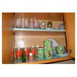 Christmas dishes in both cupboards... Christmas dishes in both cupboards...