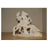 Alabaster sculpture depicting intri... Alabaster sculpture depicting intri...