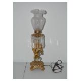 Brass electric lamp with cherub fig... Brass electric lamp with cherub fig...