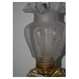 Brass electric lamp with cherub fig... Brass electric lamp with cherub fig...