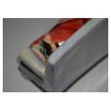 Royal Doulton porcelain seated lady... Royal Doulton porcelain seated lady...