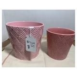 2 pink planters... 2 pink planters...