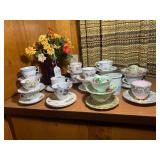 Red glass with cup and saucer colle... Red glass with cup and saucer colle...