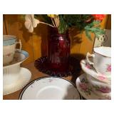 Red glass with cup and saucer colle... Red glass with cup and saucer colle...