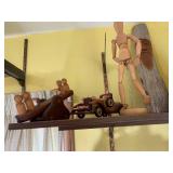 Wood carvings and books, all on 2 s... Wood carvings and books, all on 2 s...