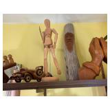 Wood carvings and books, all on 2 s... Wood carvings and books, all on 2 s...