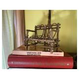 Wood carvings and books, all on 2 s... Wood carvings and books, all on 2 s...