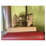 Wood carvings and books, all on 2 s... Wood carvings and books, all on 2 s...