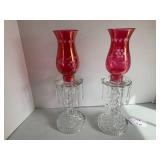 (2) Cranberry glass candle holders ... (2) Cranberry glass candle holders ...