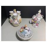 (3) German porcelain cherubs and fl... (3) German porcelain cherubs and fl...