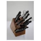Cutco Knife Set in Wooden Block with Carving Fork - Assorted Knives Included in Collection Cutco Knife Set in Wooden Block with Carving Fork - Assorted Knives Included in Collection