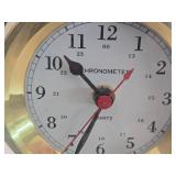 Vintage Chronometer Quartz Nautical Clock on a Brass Stand Vintage Chronometer Quartz Nautical Clock on a Brass Stand