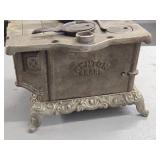 Vintage Cast Iron Cook Stove - Eva by Kenton Brand 8 1/2' x 5 1/2' x 5 1/2' Vintage Cast Iron Cook Stove - Eva by Kenton Brand 8 1/2' x 5 1/2' x 5 1/2'