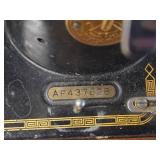 Singer Sewing Machine with Wood Flip-Top Cabinet 58' x 17' x 38' Singer Sewing Machine with Wood Flip-Top Cabinet 58' x 17' x 38'