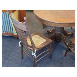 Vintage Clawfoot Wood Dining Table with (4) Wicker Seat Side Chairs Vintage Clawfoot Wood Dining Table with (4) Wicker Seat Side Chairs