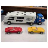 Vintage 1970's Tonka Pressed Steel Toy Car Carrier with Yellow and Red Corvette Cars Vintage 1970's Tonka Pressed Steel Toy Car Carrier with Yellow and Red Corvette Cars