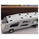 Vintage 1970's Tonka Pressed Steel Toy Car Carrier with Yellow and Red Corvette Cars Vintage 1970's Tonka Pressed Steel Toy Car Carrier with Yellow and Red Corvette Cars